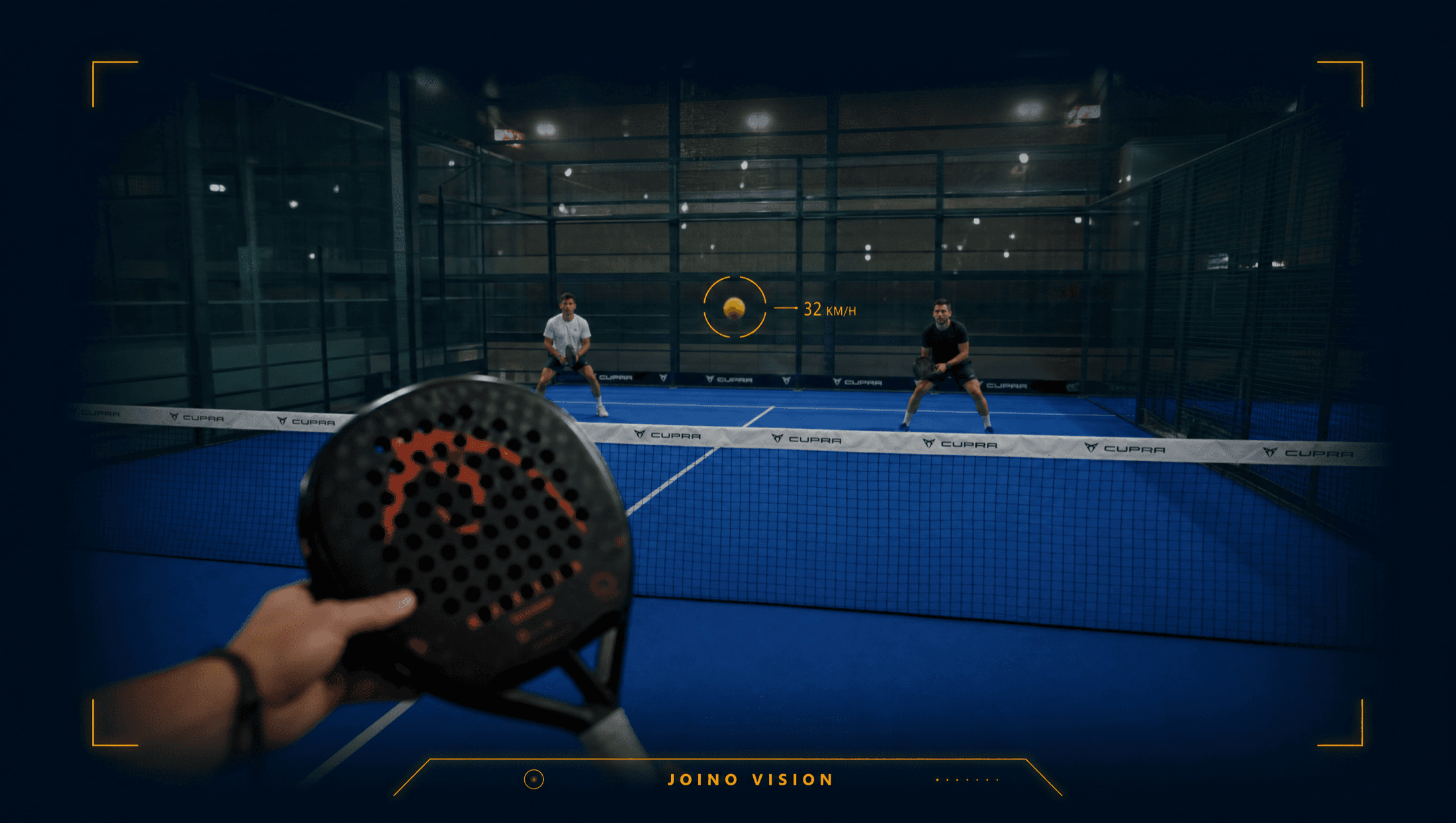 First-person view through camera glasses during a padel point, with an amber tracking overlay on the ball reading 32 km/h